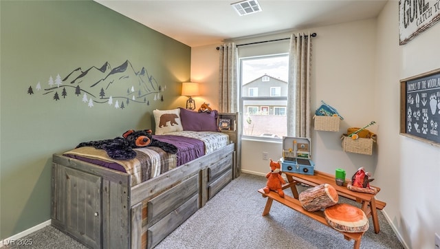 bedroom featuring baseboards, visible vents, and carpet floors