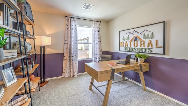 office with carpet flooring, baseboards, and visible vents