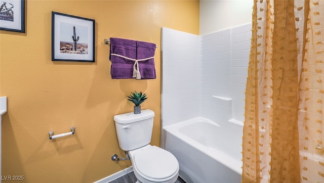 full bathroom featuring toilet and shower / washtub combination