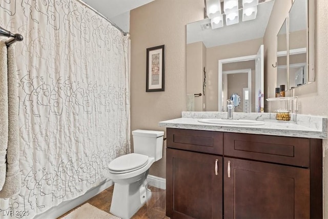 full bathroom with visible vents, toilet, and vanity