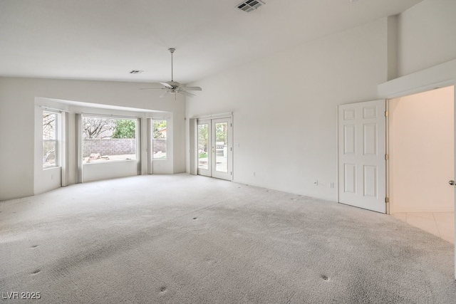 3710 E Oquendo Rd, Las Vegas, NV 89120 - carpeted empty room with a ceiling fan and high vaulted ceiling