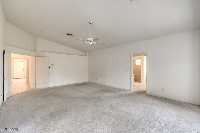 unfurnished room featuring light carpet, visible vents, high vaulted ceiling, and a ceiling fan