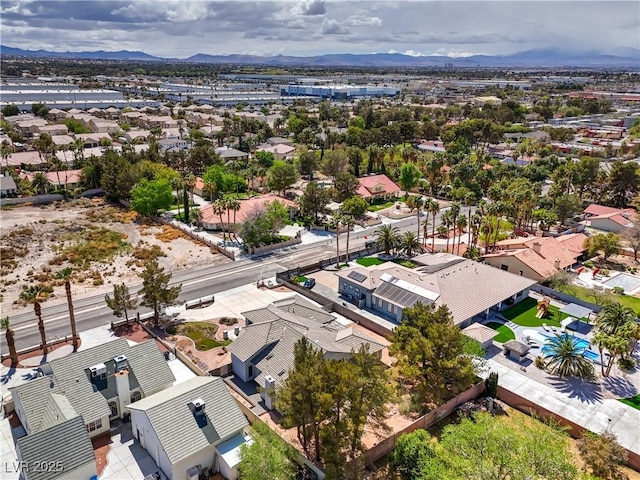 3710 E Oquendo Rd, Las Vegas, NV 89120 - aerial perspective of suburban area with a mountainous background