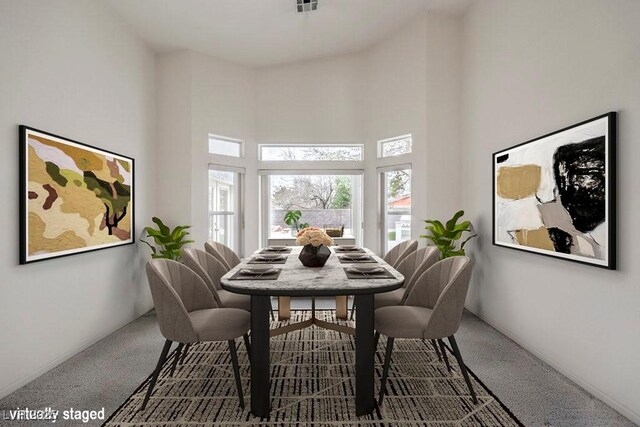 3710 E Oquendo Rd, Las Vegas, NV 89120 - dining room featuring carpet floors and a high ceiling