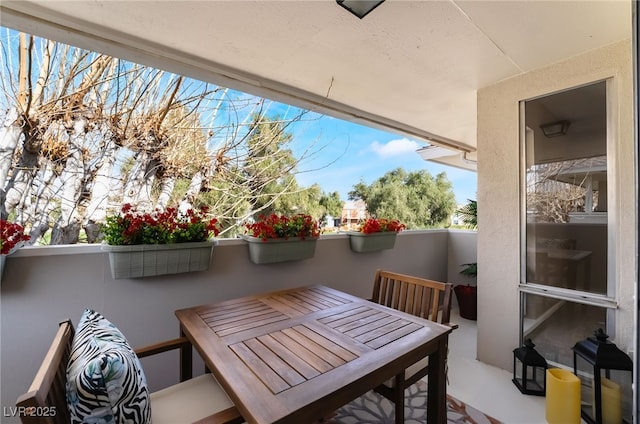 view of patio with a balcony