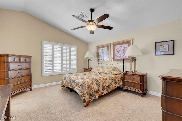 bedroom featuring lofted ceiling, carpet, and baseboards