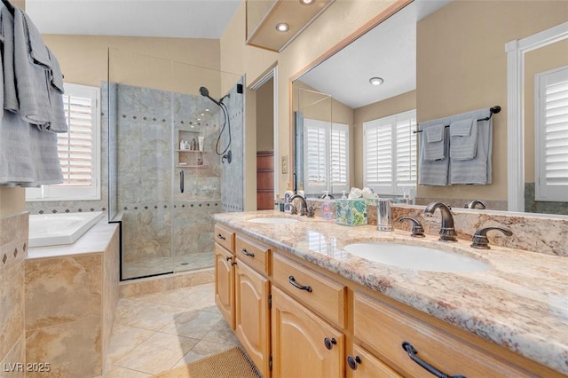 bathroom with lofted ceiling, a garden tub, a shower stall, and a sink