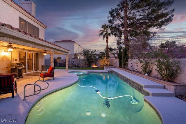 view of pool featuring a fenced in pool, a ceiling fan, a grill, a fenced backyard, and a patio area