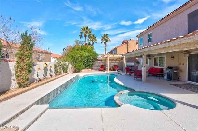 view of pool with a pool with connected hot tub, ceiling fan, a fenced backyard, a patio area, and a grill