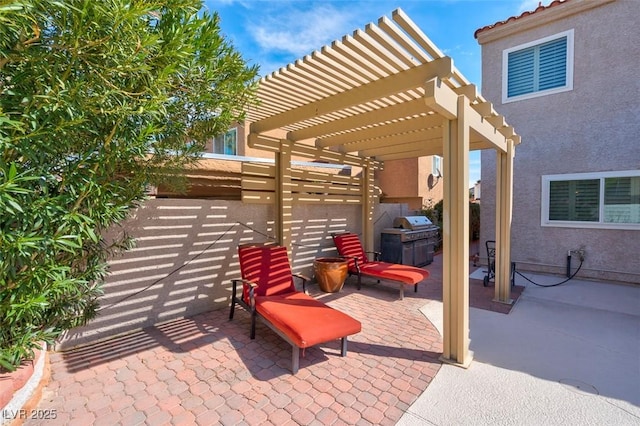 view of patio / terrace featuring a pergola and grilling area