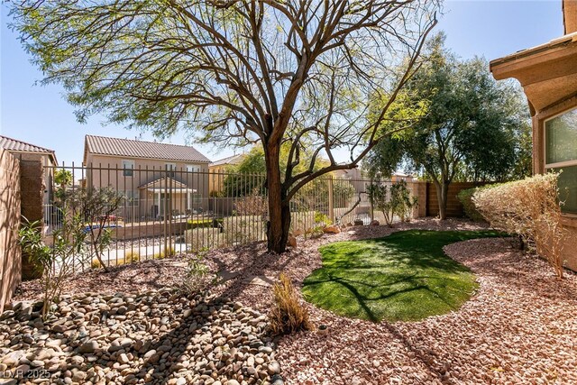 view of yard featuring a fenced backyard