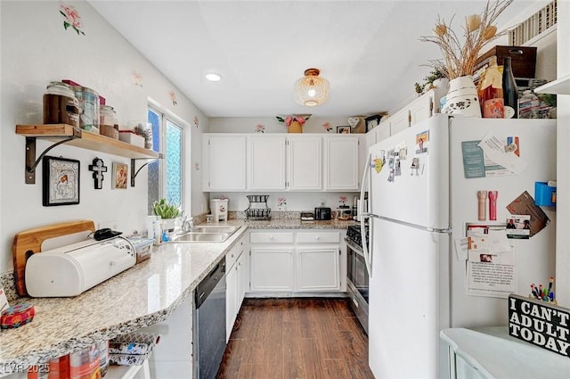 kitchen featuring a sink, open shelves, appliances with stainless steel finishes, white cabinetry, and dark wood-style flooring