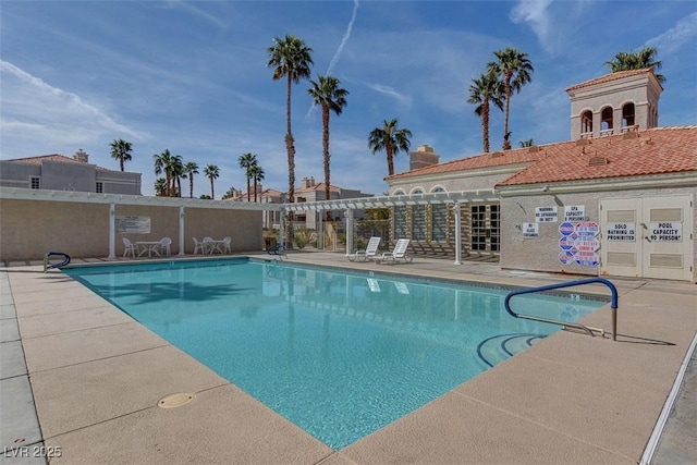 community pool featuring a patio