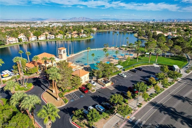 aerial view with a water view and a residential view