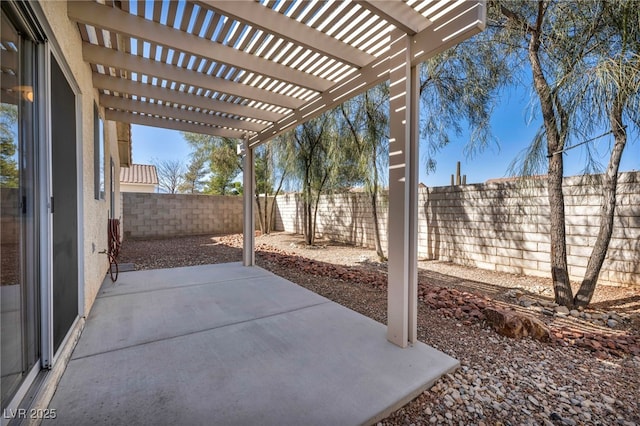 view of patio with a fenced backyard and a pergola