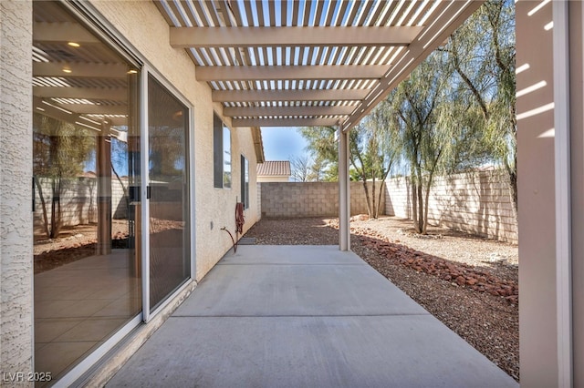 view of patio / terrace with a pergola and a fenced backyard