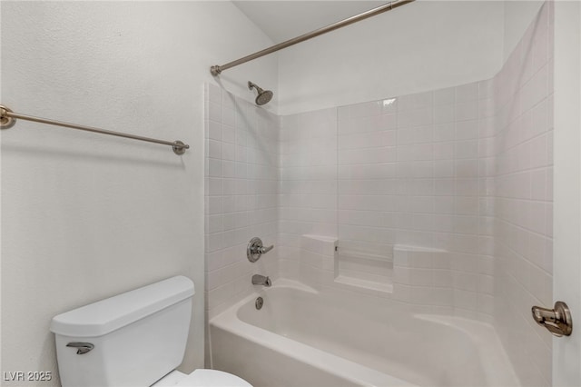 full bathroom with toilet and washtub / shower combination