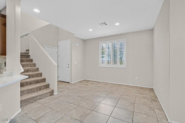 6110 Scarlet Leaf St, Las Vegas, NV 89148 - entrance foyer with stairs, light tile patterned flooring, recessed lighting, and baseboards
