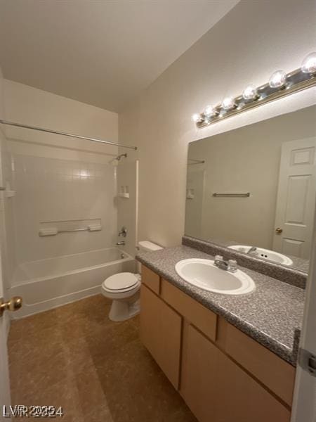 full bathroom with toilet, vanity, and washtub / shower combination