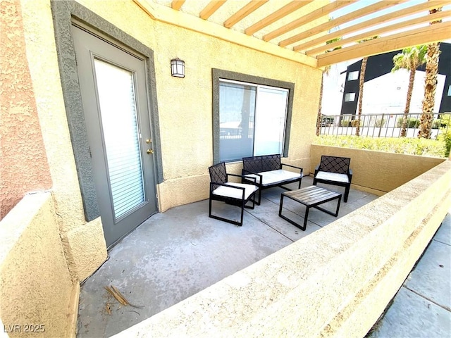 view of patio with a pergola and an outdoor hangout area