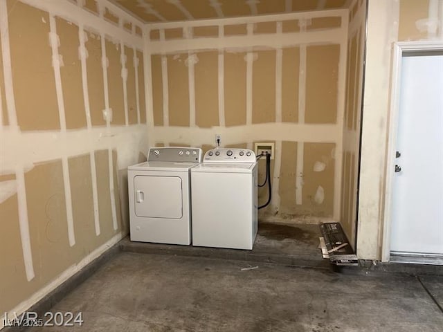 laundry room with independent washer and dryer