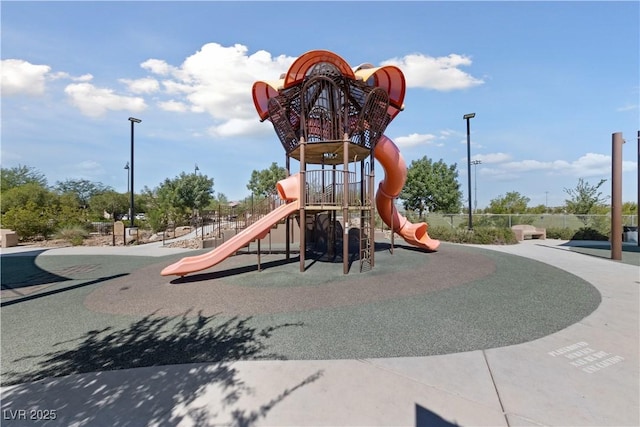 community play area featuring fence