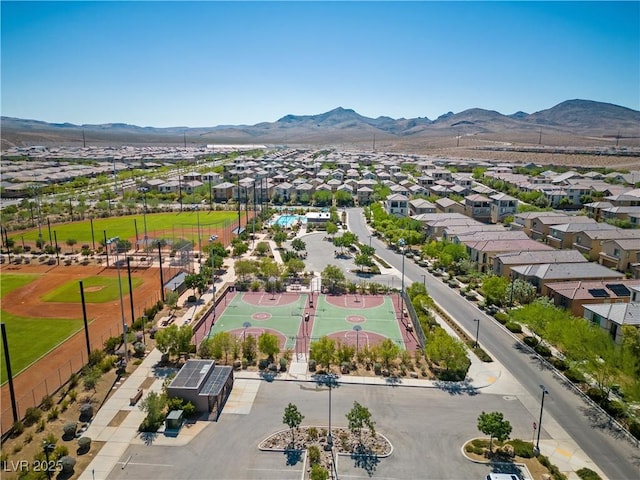 drone / aerial view featuring a mountain view and a residential view