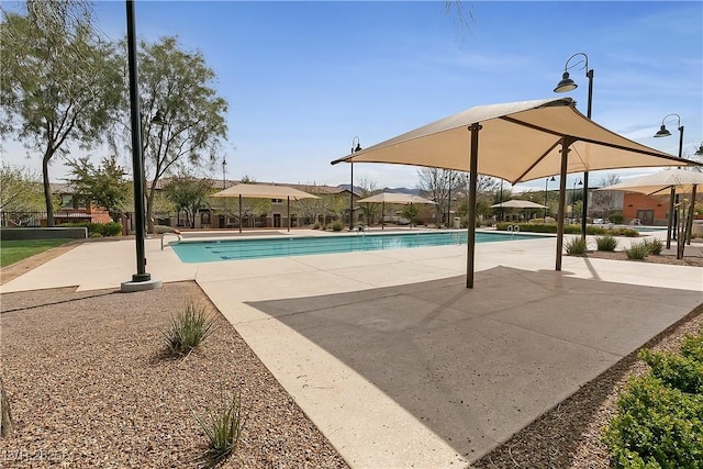 community pool featuring a patio