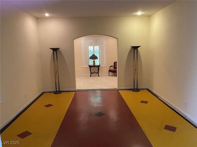 9301 Harrow Rock St, Las Vegas, NV 89143 - exercise room featuring arched walkways and baseboards