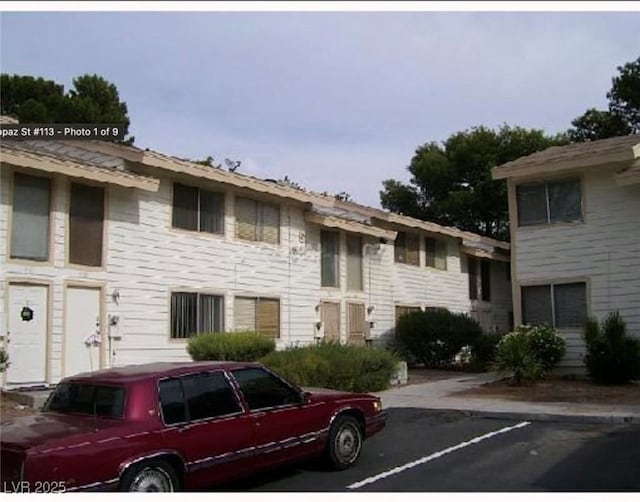 4770 Topaz St Unit 113, Las Vegas, NV 89121 - view of property featuring uncovered parking