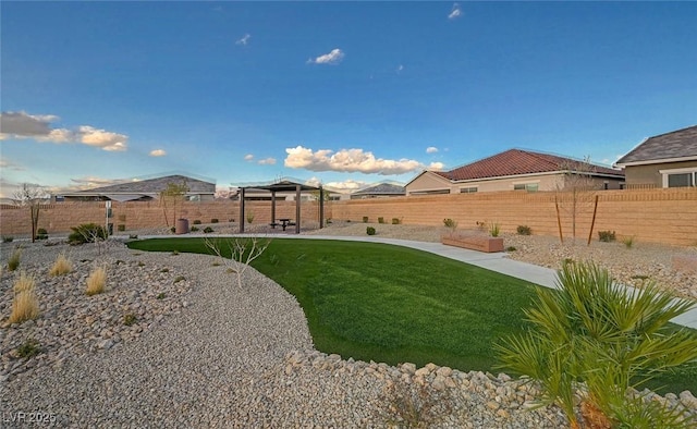 view of yard with a gazebo, a patio area, and a fenced backyard