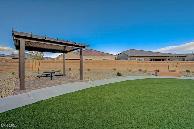 view of yard featuring a patio and a fenced backyard