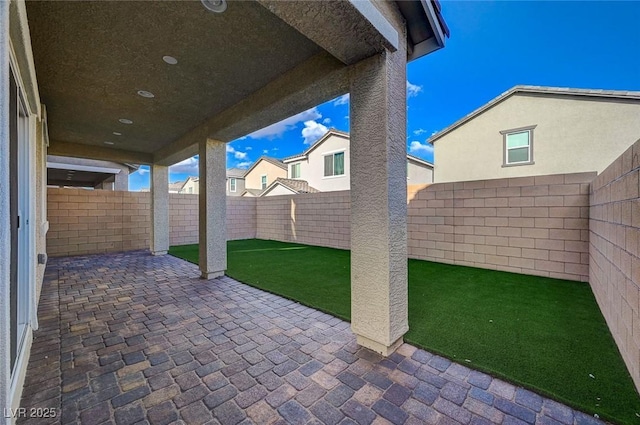 view of patio with a fenced backyard