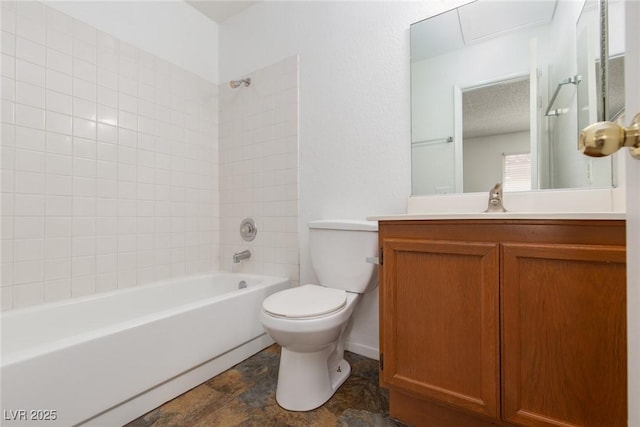 bathroom featuring tub / shower combination, toilet, and vanity