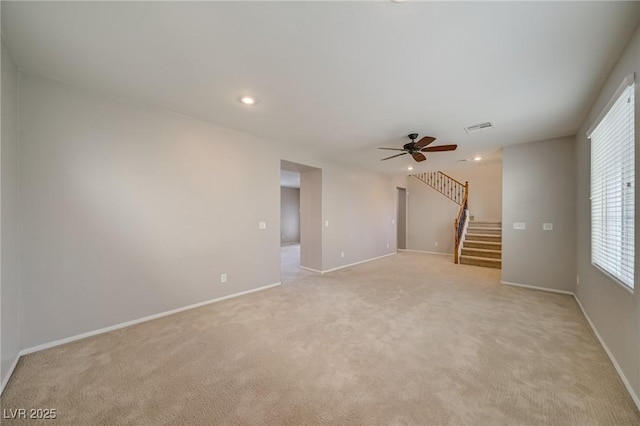 8348 Mokena Ave, Las Vegas, NV 89178 - unfurnished living room featuring stairway, a ceiling fan, light colored carpet, recessed lighting, and baseboards