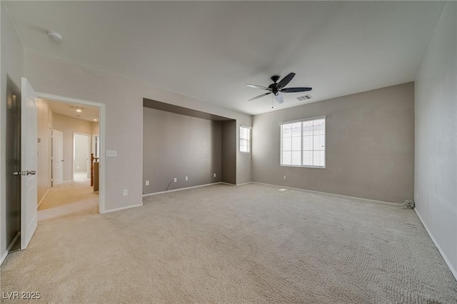 8348 Mokena Ave, Las Vegas, NV 89178 - unfurnished room featuring ceiling fan, light carpet, a smoke detector, and baseboards