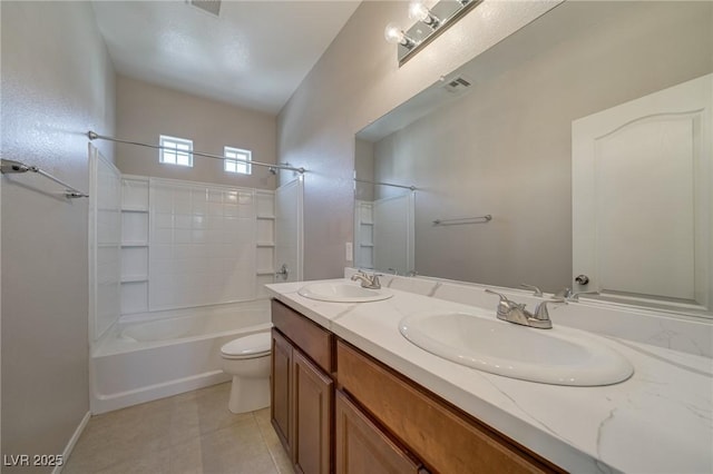 8348 Mokena Ave, Las Vegas, NV 89178 - bathroom with double vanity, shower / bathtub combination, toilet, and tile patterned flooring
