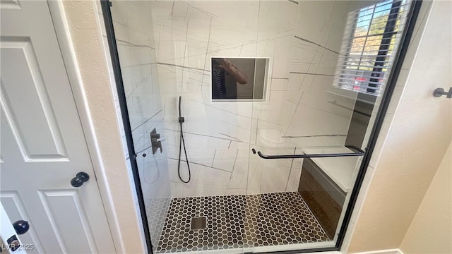 full bathroom with a shower stall