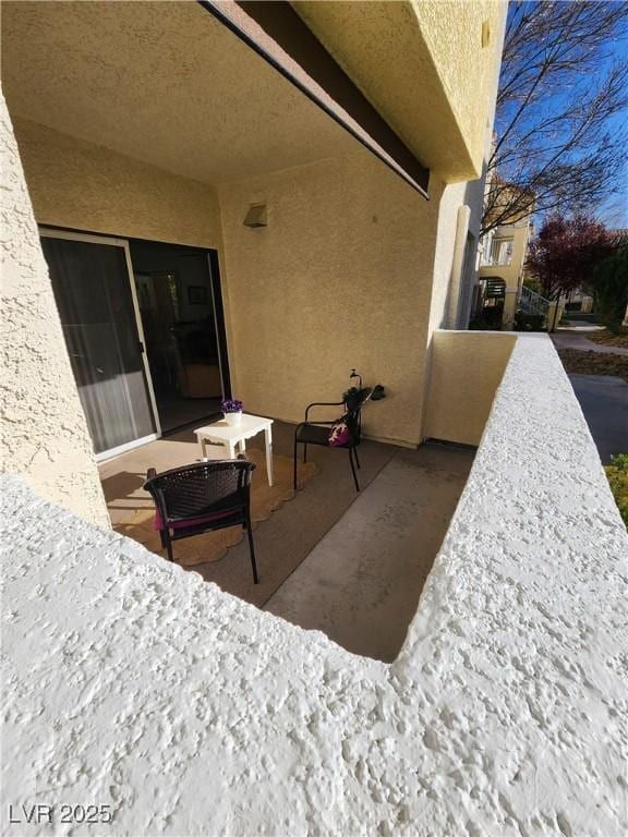 view of patio / terrace featuring a balcony