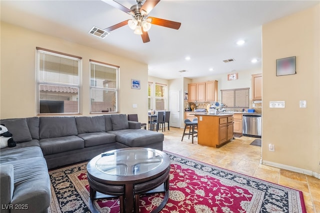 6177 W Cougar Ave, Las Vegas, NV 89139 - living area featuring baseboards, recessed lighting, visible vents, and ceiling fan