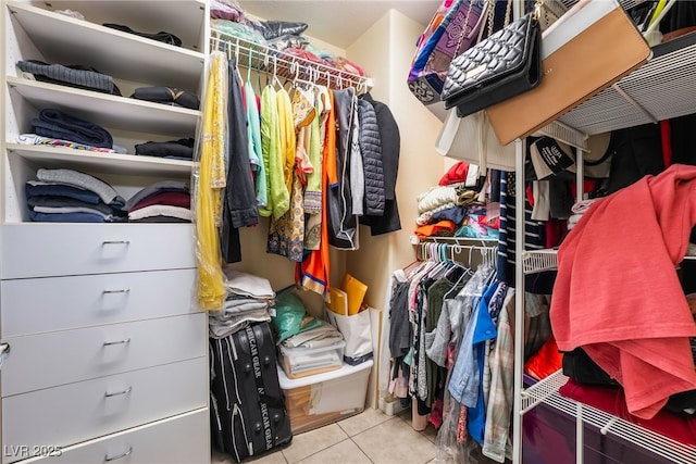 6177 W Cougar Ave, Las Vegas, NV 89139 - walk in closet featuring tile patterned flooring