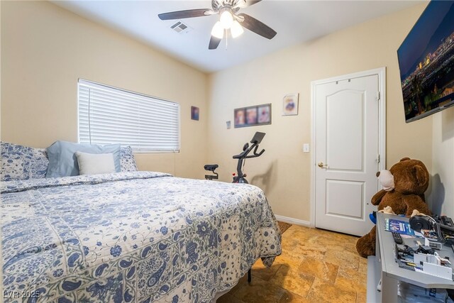6177 W Cougar Ave, Las Vegas, NV 89139 - bedroom with stone finish floor, baseboards, visible vents, and ceiling fan
