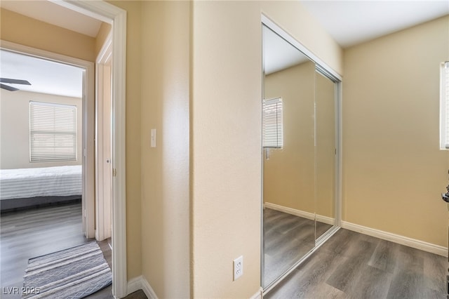 6177 W Cougar Ave, Las Vegas, NV 89139 - hallway with wood finished floors and baseboards