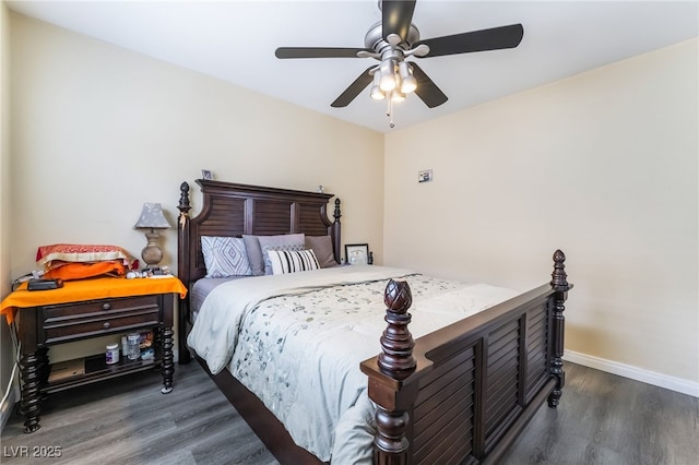 6177 W Cougar Ave, Las Vegas, NV 89139 - bedroom with a ceiling fan, baseboards, and wood finished floors