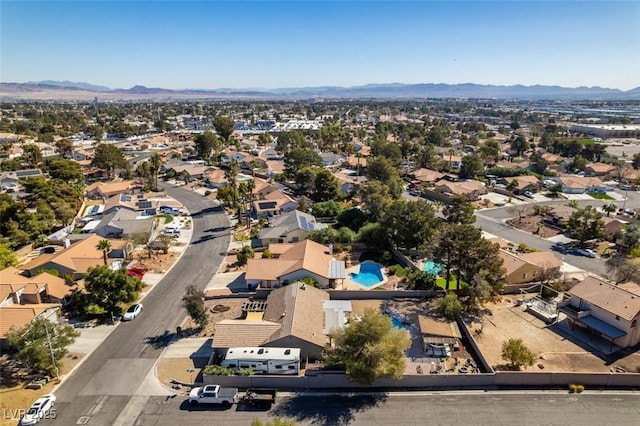 drone / aerial view with a mountain view and a residential view