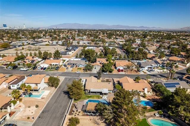 drone / aerial view with a mountain view and a residential view