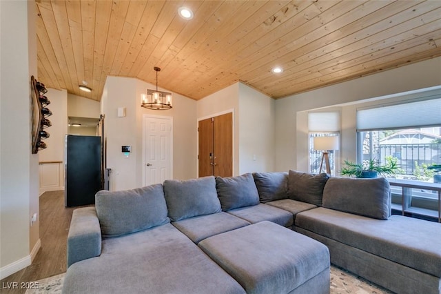 living area with baseboards, wood ceiling, light wood-type flooring, lofted ceiling, and recessed lighting