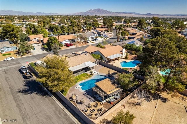 bird's eye view featuring a mountain view and a residential view