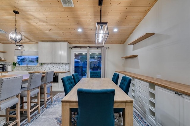 dining space with visible vents, recessed lighting, wooden ceiling, and vaulted ceiling