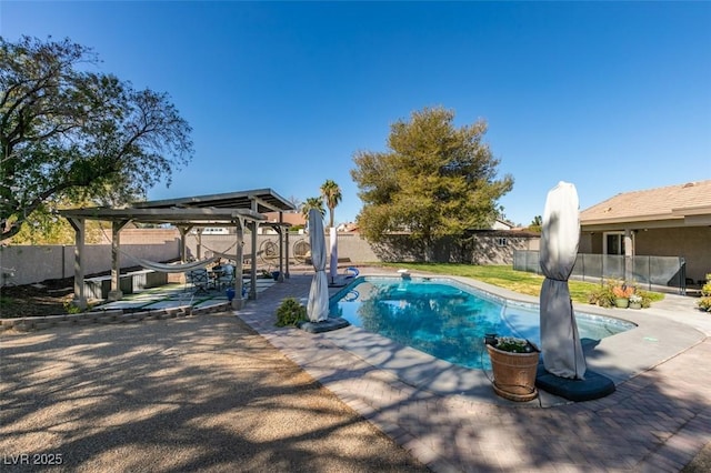 view of pool featuring a fenced in pool, a patio, and a fenced backyard